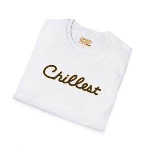 A folded white t-shirt featuring "Chillest" in bold, brown cursive across the front and a visible neck tag. Product: 5984943234744960070_2048.jpeg.