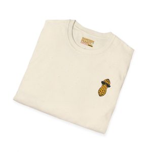 Folded cream-colored 11443567858913710064_2048.jpeg Hancock’s Big Crop Shirt featuring a small embroidered peanut wearing sunglasses on the chest and a branded label inside the collar.