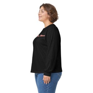 A person in profile wearing the 13436374242602698545_2048.jpeg black long-sleeved shirt with red text on the chest and blue jeans.